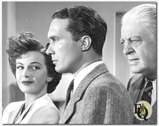 A scene from "Thrill Of A Romance"&nbsp;(MGM, May 23. 1945) with Frances Gifford, Carleton G. Young and Thurston Hall.