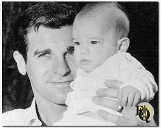 Candid photo of Lee Philips showing his daughter Julie (ca.1960).