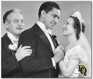 Abie (Richard Bond) toont zijn Ierse Rose (Marian Shockley) aan Poppa (Alfred White). 